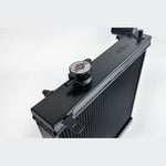 CSF 7228B black aluminum half-size performance radiator for Mitsubishi Lancer Evolution 7, 8, and 9.