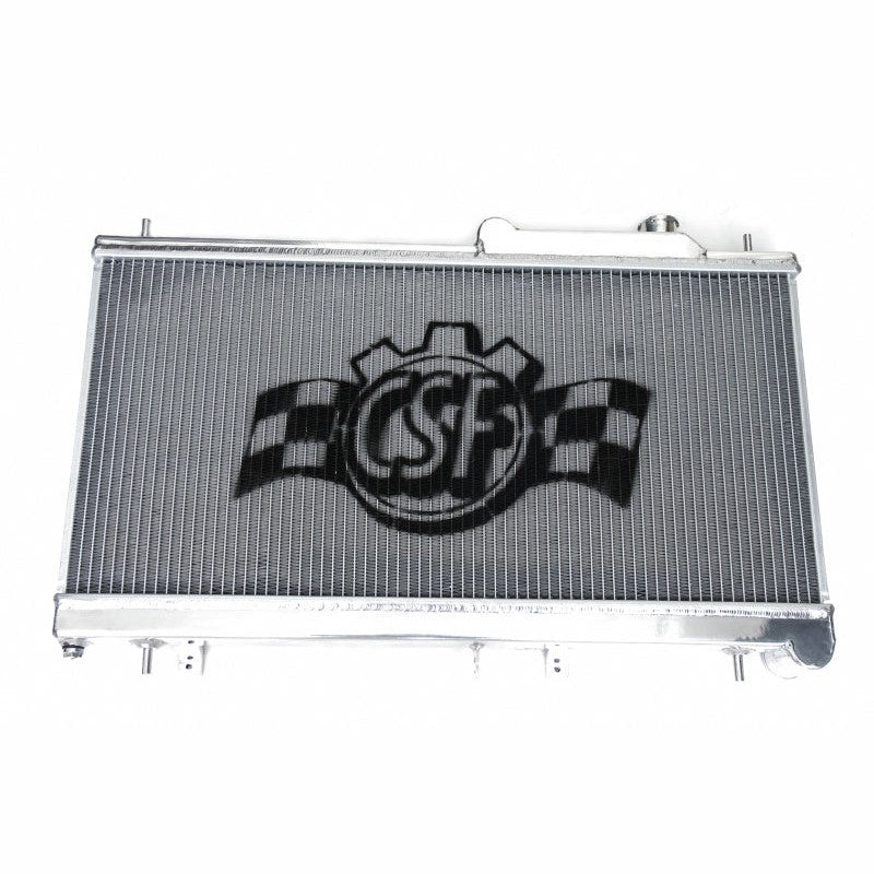 Polished 2-row aluminum performance radiator with TIG-welded tanks and CNC-machined mounting brackets.