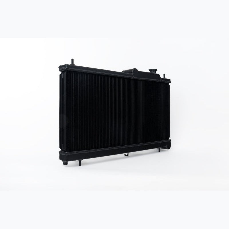 CSF 7095B black 2-row all-aluminum radiator with B-tube core technology and CNC-machined brackets for Subaru WRX and STI