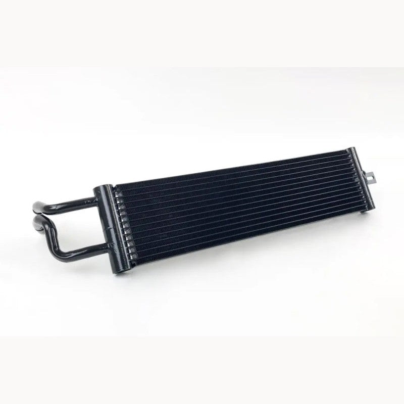 Silver CSF 8103 Race-Spec Dual-Pass DCT oil cooler for BMW F87 M2 showing the aluminum cooling core and mounting points.
