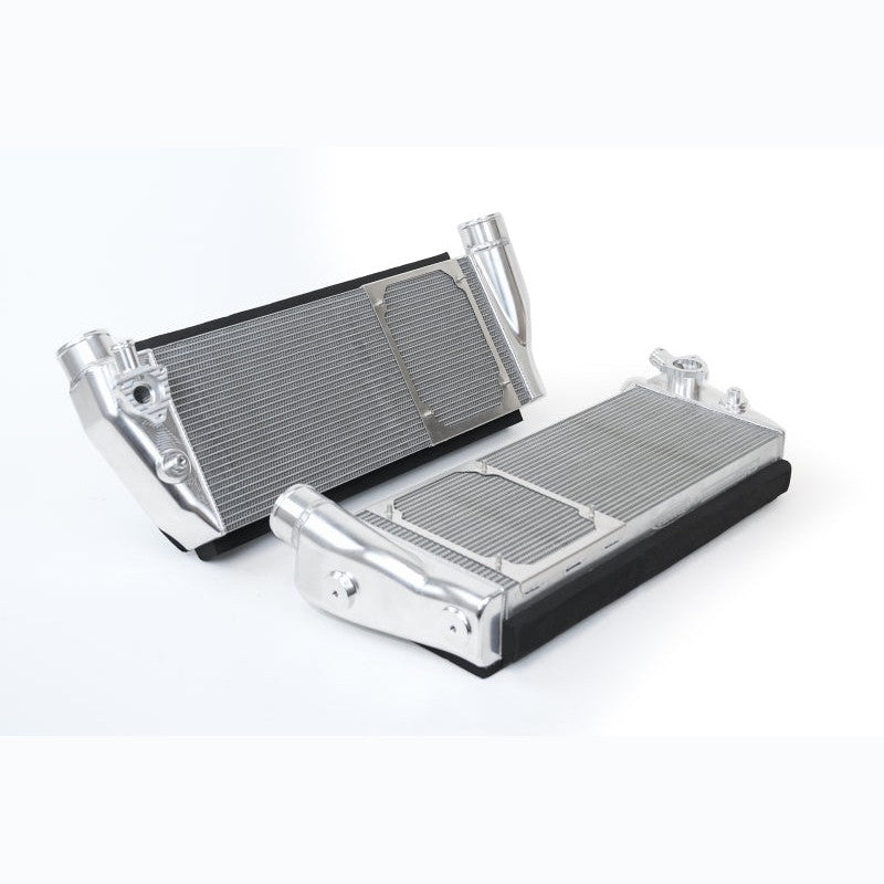 Pair of raw finish CSF high-performance intercoolers with billet end tanks for Ferrari 488 and F8 models