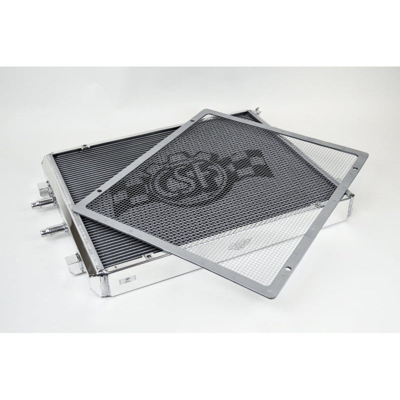 Polished aluminum CSF front mount heat exchanger with removable rock guard for 2014-2021 BMW models.