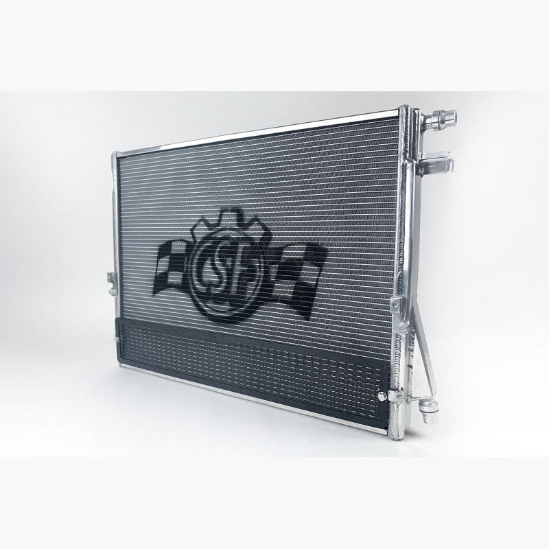 Satin finish aluminum CSF 8154 high-performance heat exchanger with integrated rock guard for BMW and Toyota GR Supra.