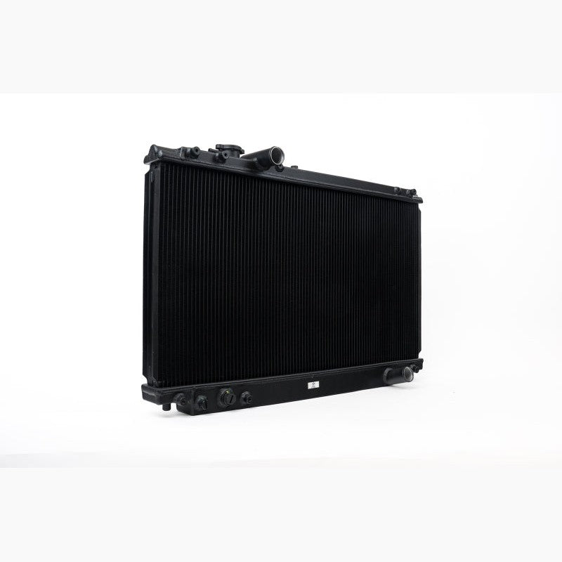 CSF 2882B black finish all-aluminum 2-row performance radiator with CNC-machined fittings for Toyota MK4 Supra