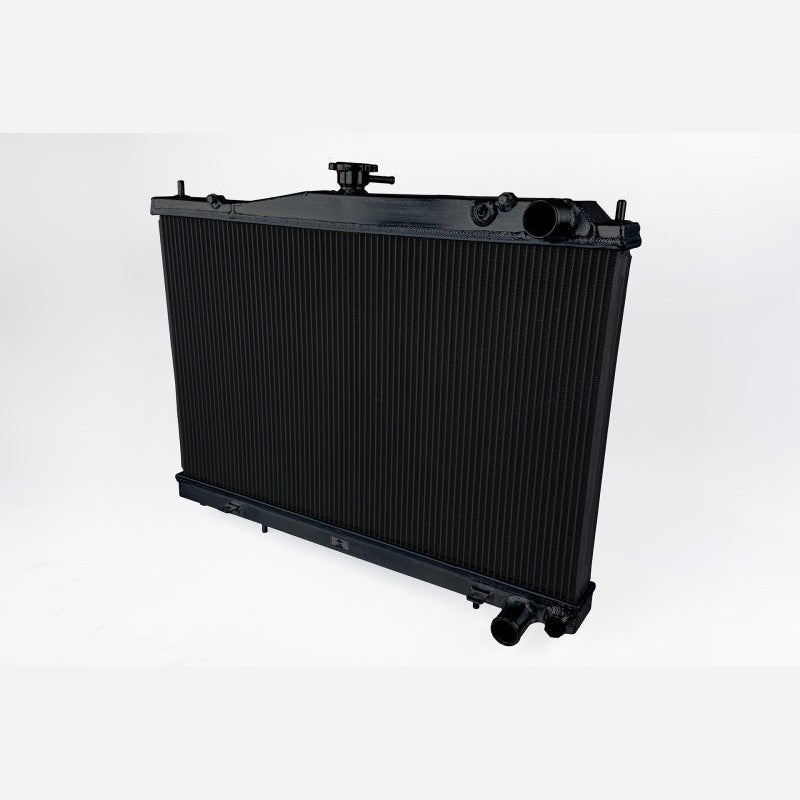 Satin black all-aluminum CSF radiator for Nissan R33 GT-R with 2-row 42mm core and high-pressure cap.