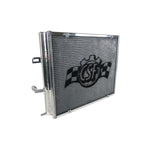 Polished aluminum CSF 8131 triple-pass heat exchanger for BMW B48 B58 with 2-row core and black rock guard.