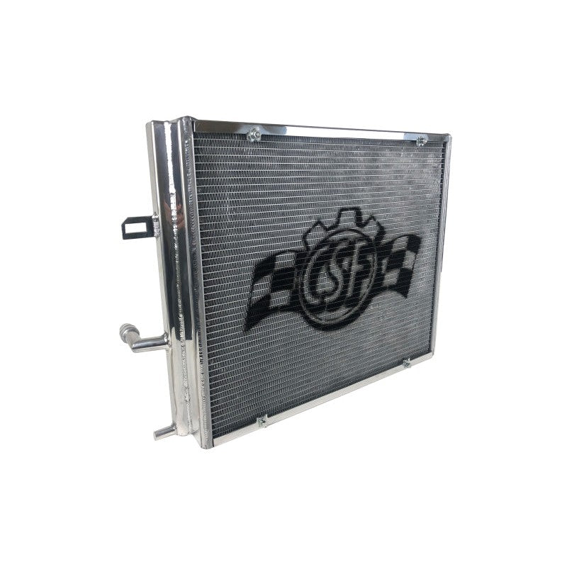 Polished aluminum CSF 8131 triple-pass heat exchanger for BMW B48 B58 with 2-row core and black rock guard.