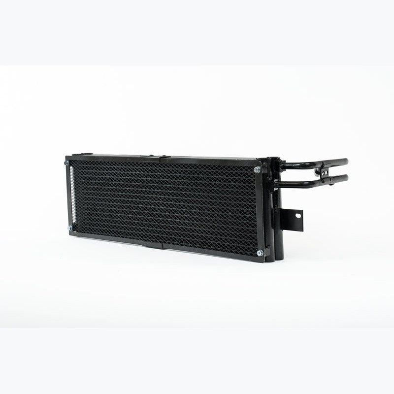 CSF dual-core aluminum transmission oil cooler featuring a protective rock guard and OEM quick-connect ports.