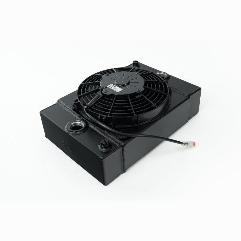 Black CSF 7065B universal drag race radiator with 9-inch SPAL fan and threaded inlet/outlet bungs.