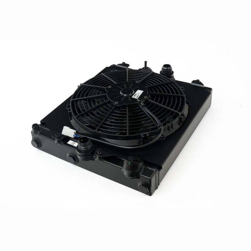 CSF 2858XB black aluminum half radiator with 12-inch SPAL fan, protective shroud, and CNC machined fittings.