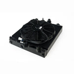 CSF 2858XB black aluminum half radiator with 12-inch SPAL fan, protective shroud, and CNC machined fittings.