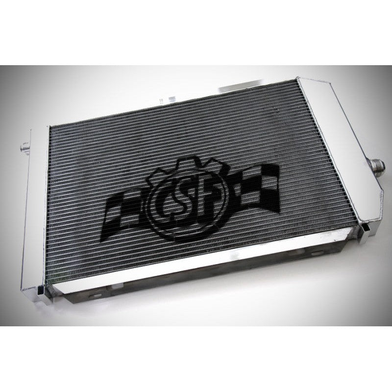 CSF 8023 universal triple-pass radiator with black powder-coated core, satin aluminum end tanks, and -AN fittings.