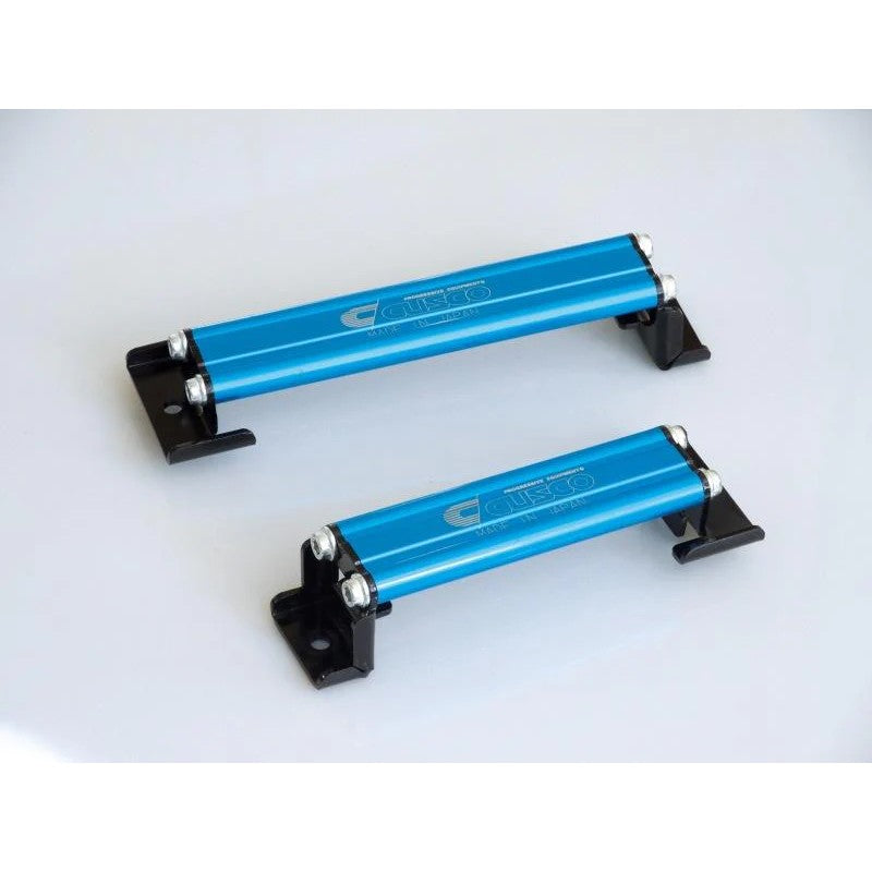 Cusco blue anodized aluminum battery tie down for Subaru BRZ, Scion FR-S, and Toyota 86
