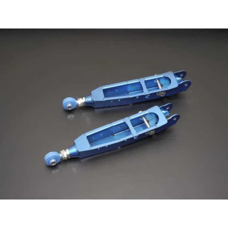 Cusco adjustable rear lateral control arms with blue powder coat finish and pillowball joints for Subaru WRX and GR86/BRZ.