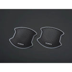 Cusco carbon-fiber style door handle protector films for 2022+ Toyota GR86 and Subaru BRZ.