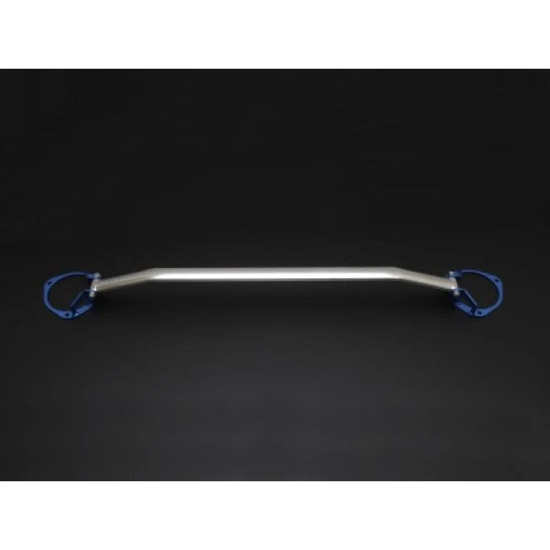 Cusco front strut tower brace featuring an aluminum crossbar and blue end plates for a 2015 Subaru Impreza.