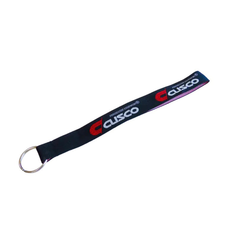 Black Cusco keychain strap with white logo branding and silver metal split ring