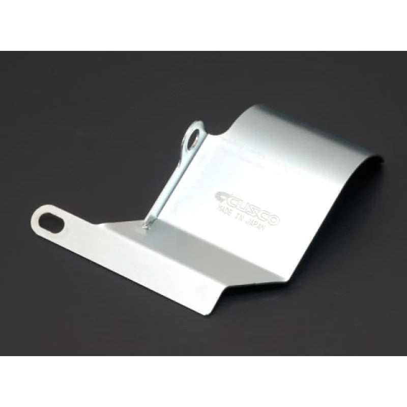 Cusco steel drive shaft heat shield for the front right side of a Subaru WRX STI with 6-speed manual transmission