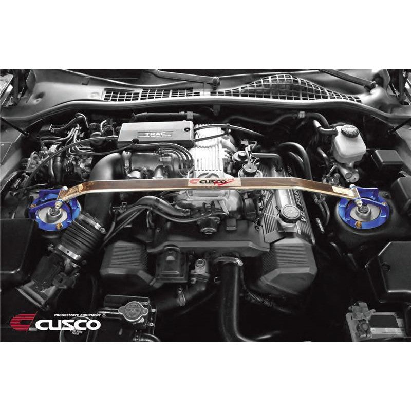 Cusco Type OS polished aluminum front strut tower bar with blue end plates for 1992-2000 Lexus SC400.