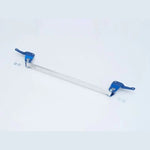 Cusco Type OS front strut tower bar with polished oval aluminum bar and blue brackets for Tesla Model 3.