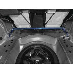 Cusco Type OS rear strut tower bar with a polished aluminum oval shaft and Cusco Blue steel brackets.