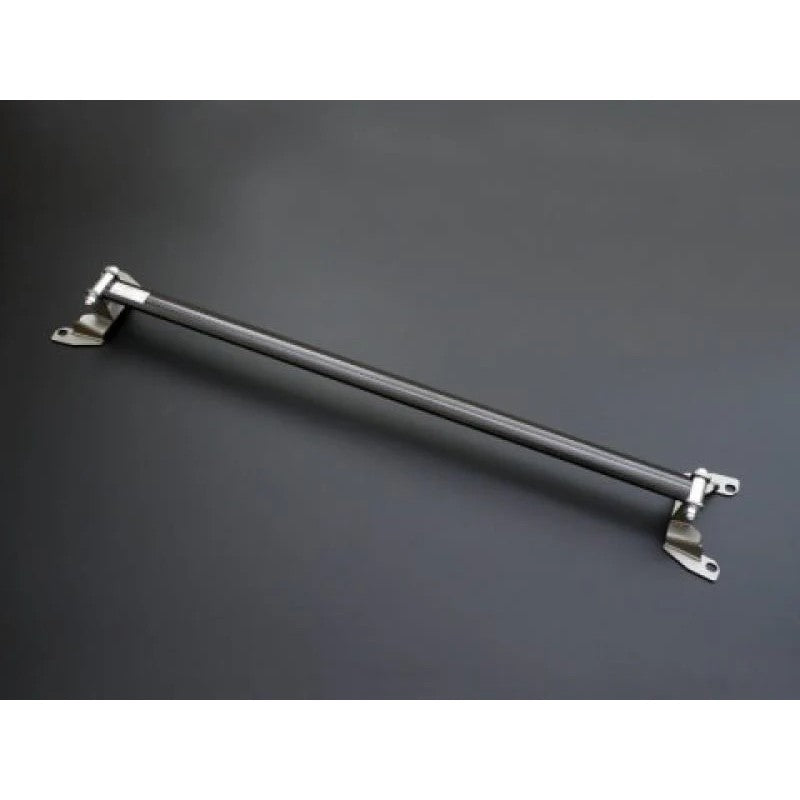 Cusco Type ALC OS rear strut tower bar featuring a carbon fiber wrapped aluminum shaft and blue steel brackets.