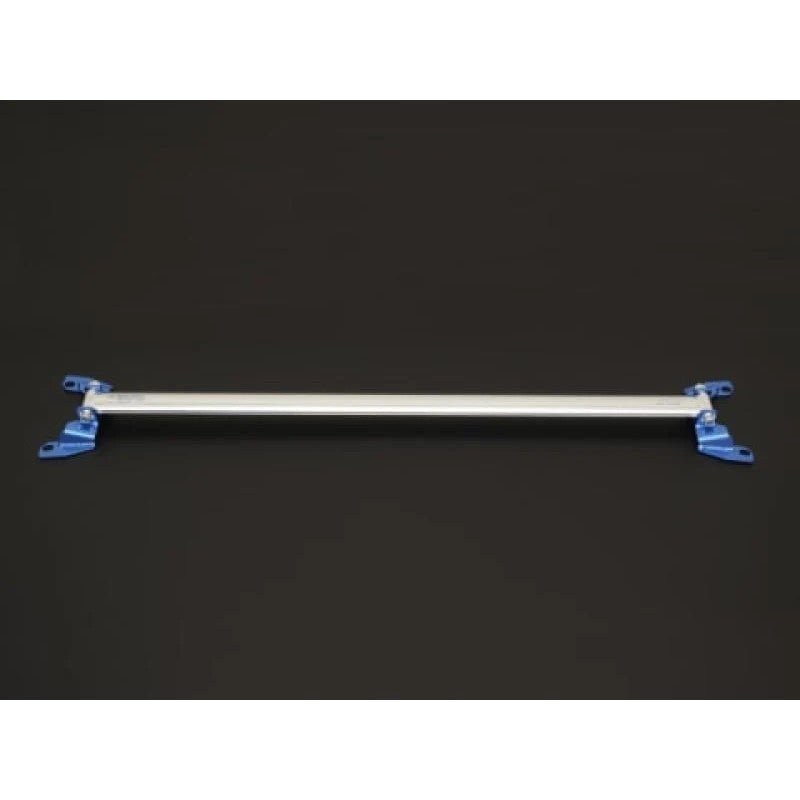 Cusco Type-OS rear strut tower bar featuring a polished aluminum oval shaft and blue steel end brackets.