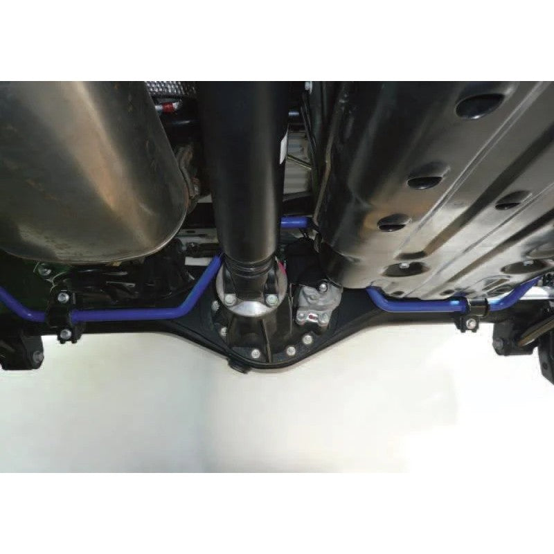 Blue Cusco 22mm rear sway bar with included mounting bushings for Toyota FJ Cruiser.