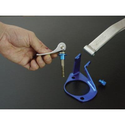 Cusco Type OS quick release lever set for tool-less strut tower bar removal and installation.