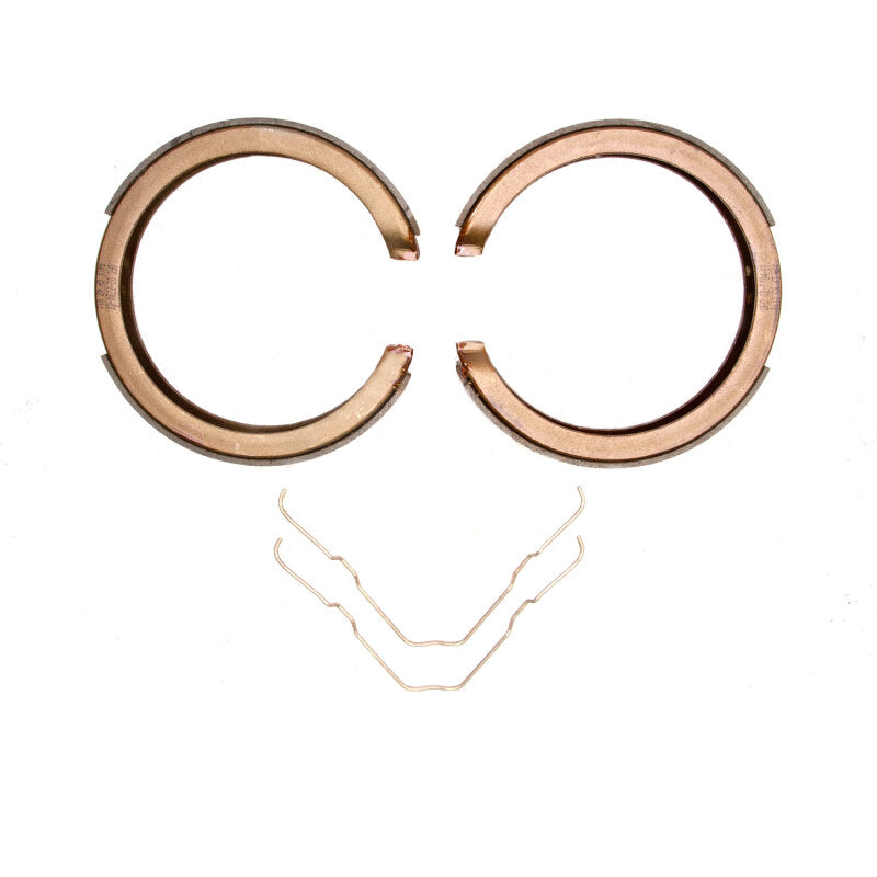 Set of DFC semi-metallic parking brake shoes with black anti-rust coating and precision-ground friction material.