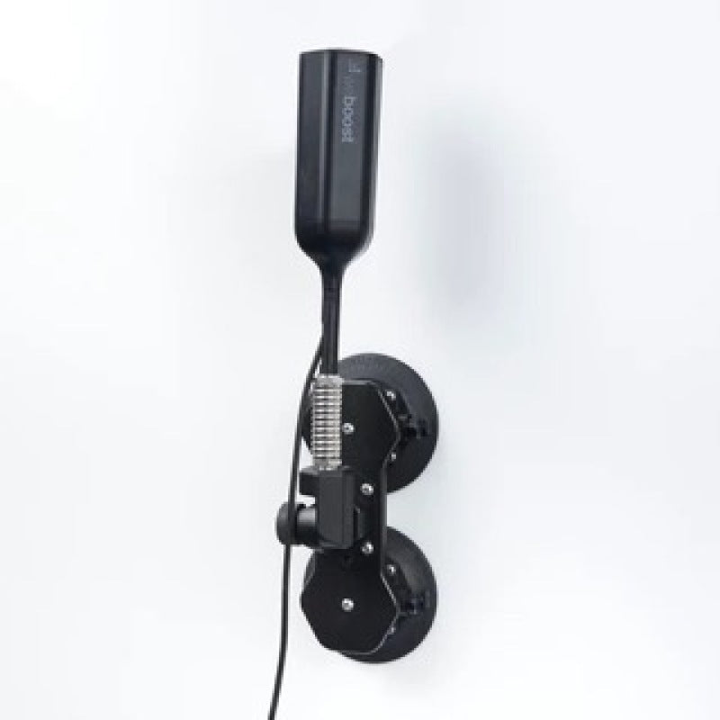 SeaSucker black vacuum mount with integrated hand pump for securing a weBoost cellular antenna to a vehicle roof or window.