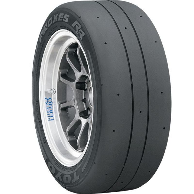 Toyo Proxes RR competition tire featuring a two-groove symmetric tread design for dry track racing.