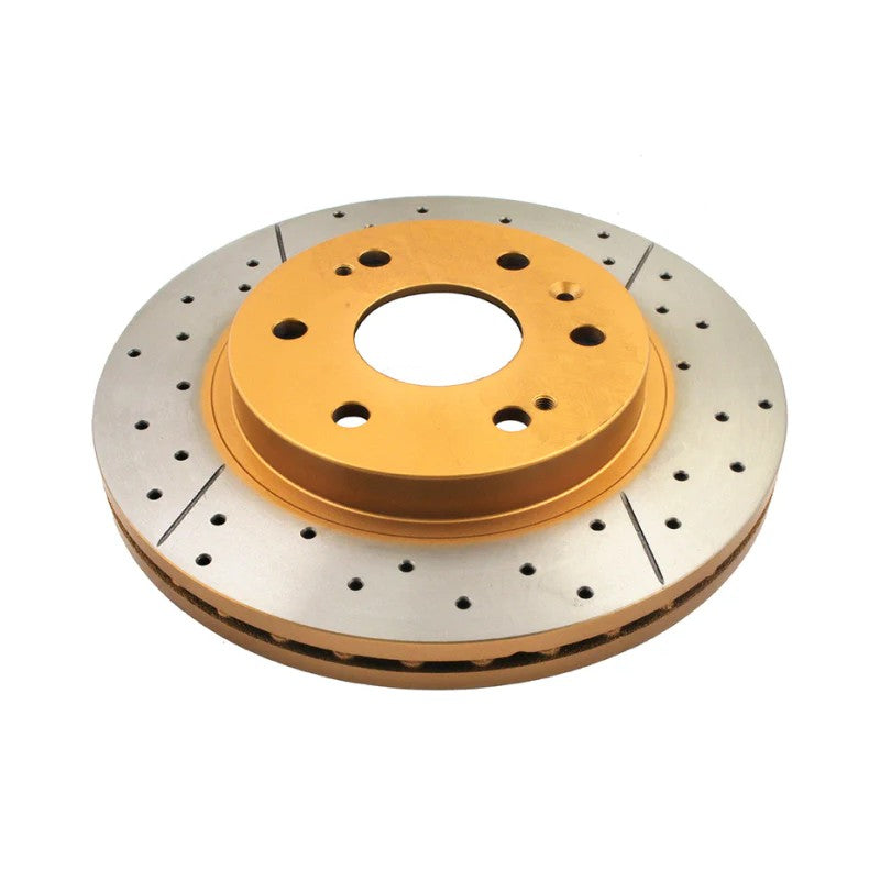 DBA Street Series X Gold front brake rotor with cross-drilled and slotted patterns and a gold-painted hub