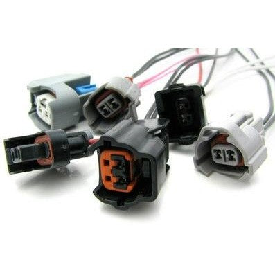 DeatschWerks Nissan side-feed fuel injector electrical connector clips and pigtails