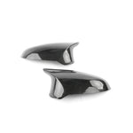 Dinan gloss carbon fiber replacement mirror covers with injection-molded clips for 2015-2021 BMW M-series.