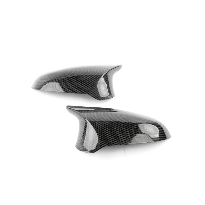 Dinan gloss carbon fiber replacement mirror covers with injection-molded clips for 2015-2021 BMW M-series.