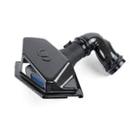 Dinan carbon fiber intake tube with high-flow cone filter and enlarged semi-open airbox for BMW B58 engines.