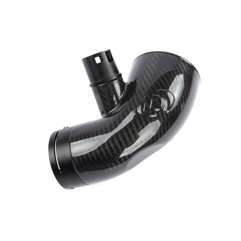 Dinan gloss carbon fiber turbo inlet pipe with integrated CNC machined fittings for BMW B58 engines.