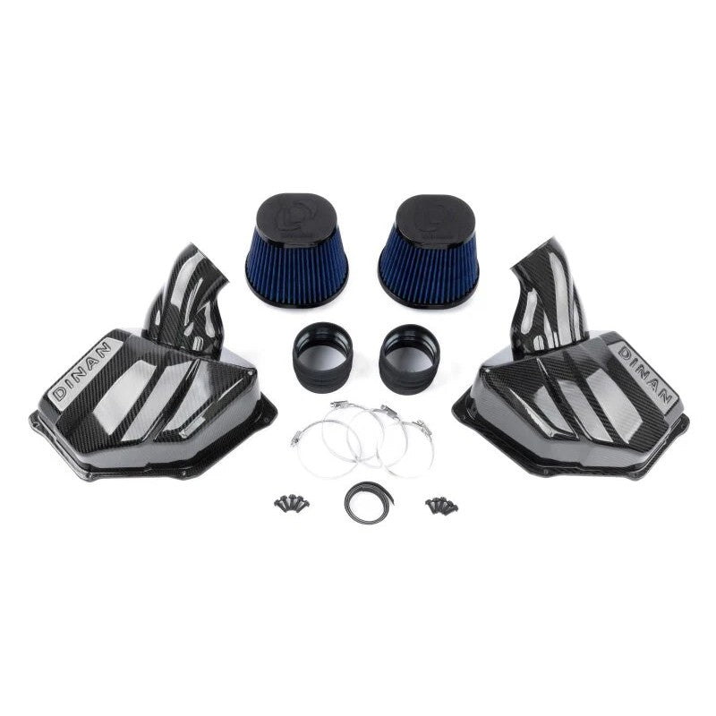 Dinan carbon fiber cold air intake kit with high-flow cone filters and enlarged airbox lids for BMW M550i and M850i.