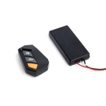 Dinan dual exhaust valve remote kit featuring wireless remote, control module, and weatherproof wiring harnesses.