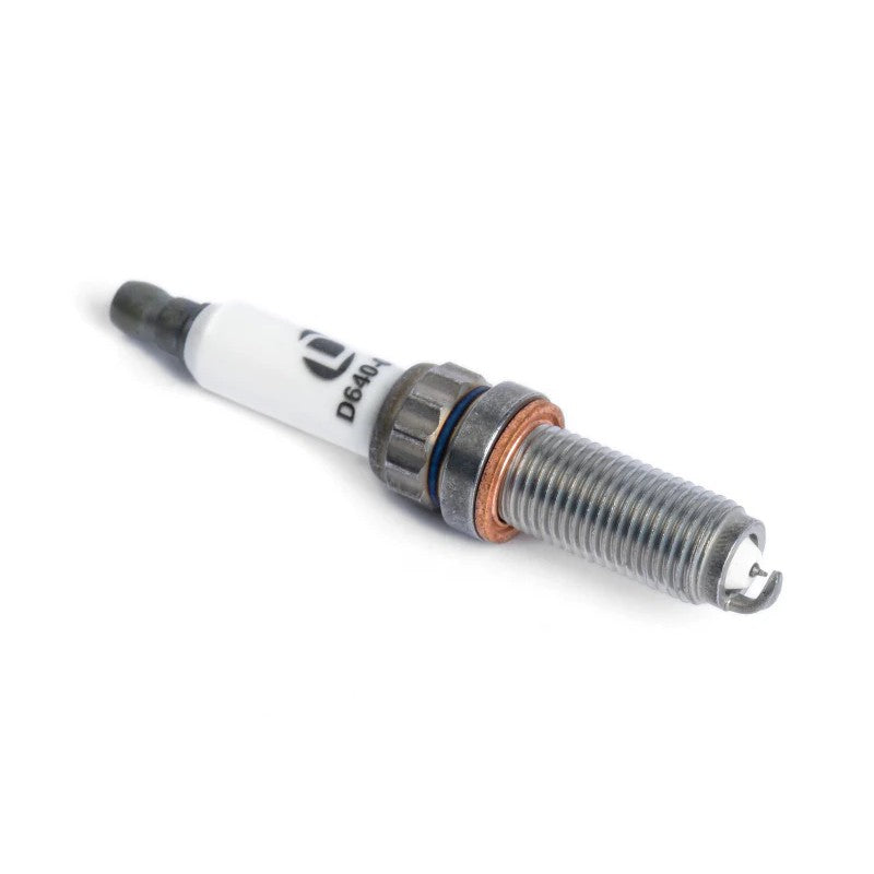 Dinan Iridium spark plug D640-0002 with 14mm bi-hex head and projected ceramic insulator for BMW engines.