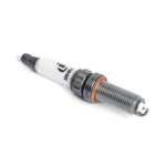 Dinan Iridium spark plug D640-0002 with 14mm bi-hex head and projected ceramic insulator for BMW engines.