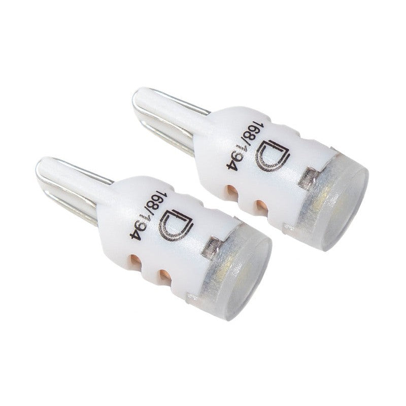 Pair of Diode Dynamics HP5 194 LED bulbs featuring a cool white 6000K diffused lens and dual-lead copper contacts.