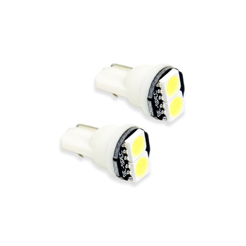 A pair of Diode Dynamics 194 SMD2 LED bulbs with dual 5050 SMDs and sturdy molded double terminals.
