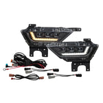 Diode Dynamics Elite Series white LED fog lamp housing featuring triple rectangular projectors and integrated light blade.