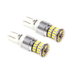 A pair of Diode Dynamics 921 HP36 LED bulbs featuring an aluminum heat sink and 36 cool white Samsung LEDs.