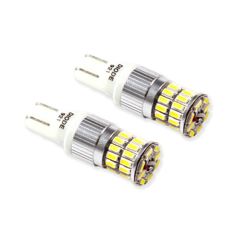 A pair of Diode Dynamics 921 HP36 LED bulbs featuring an aluminum heat sink and 36 cool white Samsung LEDs.