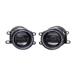 A pair of Diode Dynamics Elite Series Type B White Fog Lamps showing the custom optics and internal LED circuitry.