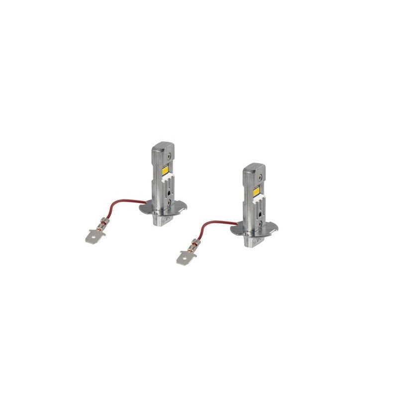 A pair of Diode Dynamics SL2 H3 LED fog light bulbs featuring a yellow emitter and compact metal heatsink design.
