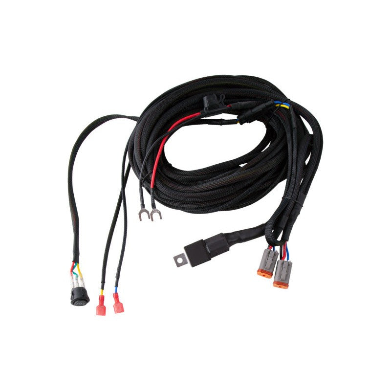 Diode Dynamics DD4102 reverse light wiring harness featuring dual Deutsch DT connectors and an inline 10A waterproof fuse.